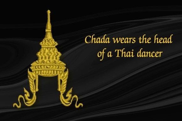 Chada Wears the Head of a Thai Dancer
