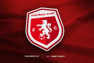 Red logo soccer patch on jersey fabric