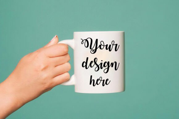 A Hand Holding White Coffee Mug Graphics