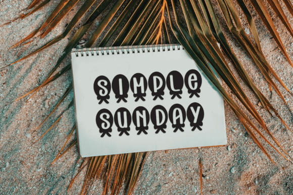 Christmas Ribbon Font font preview - 2
