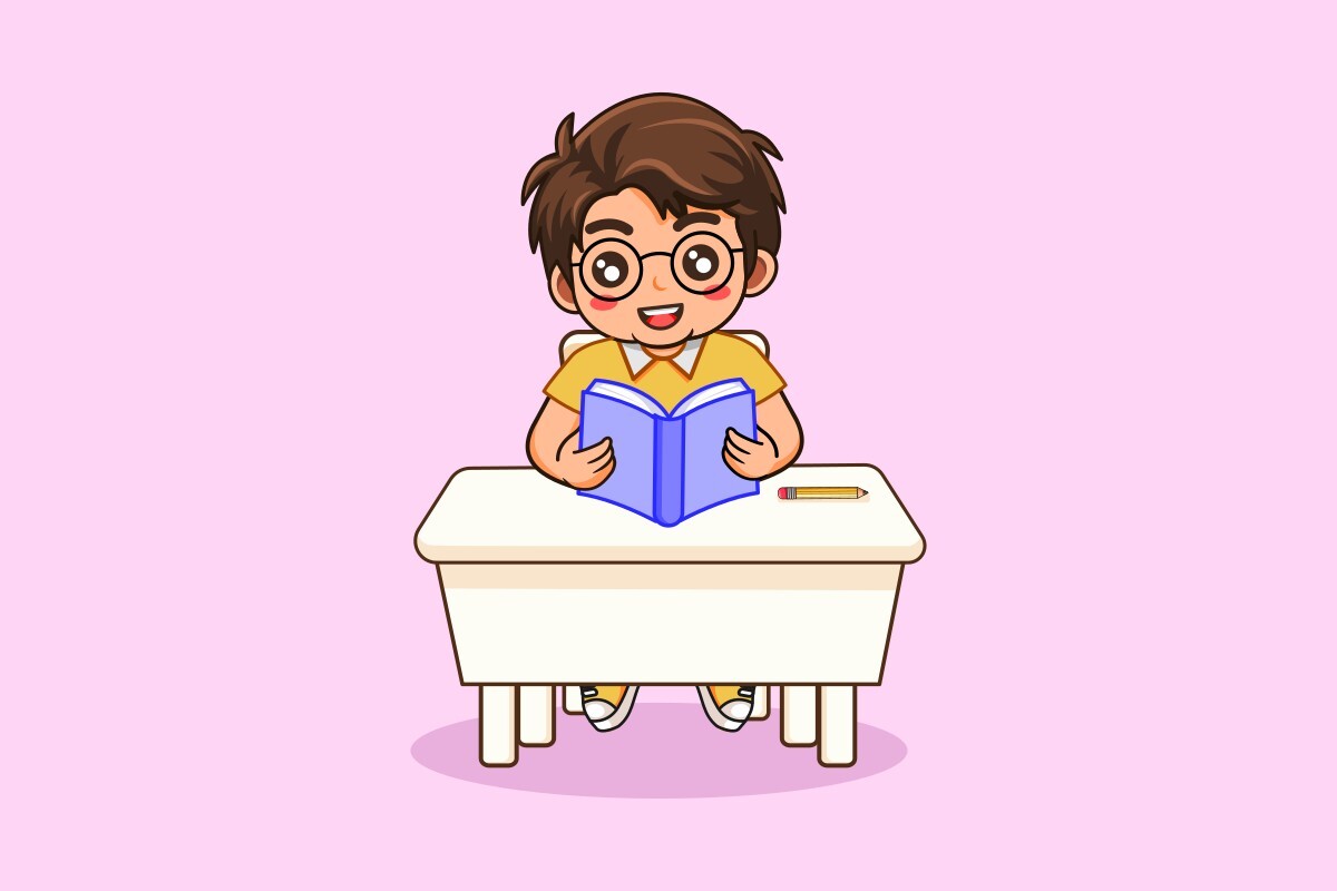 Cute Boy Sitting at Desk Reading Book