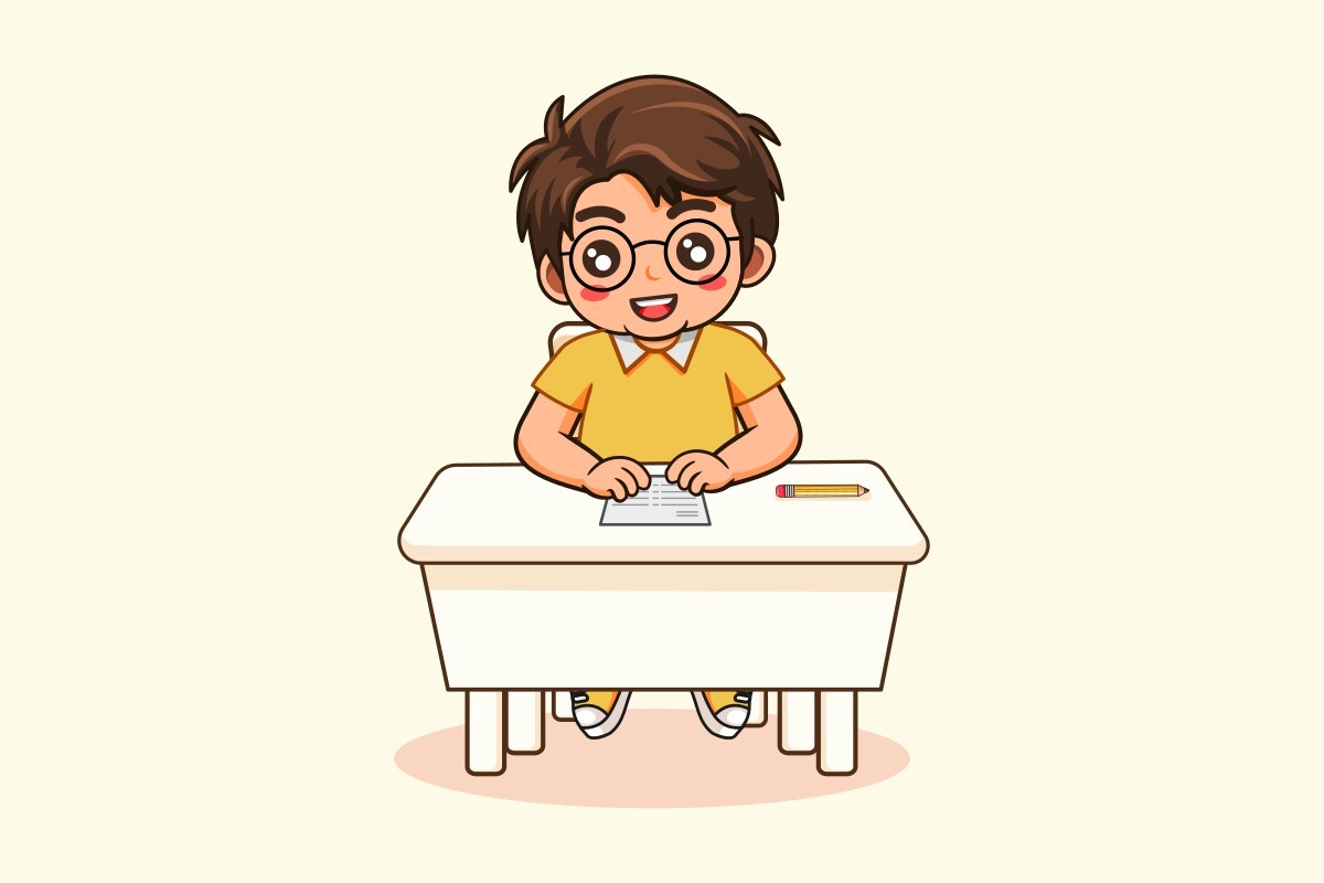 Cute Boy Student Sitting at Desk Studyin