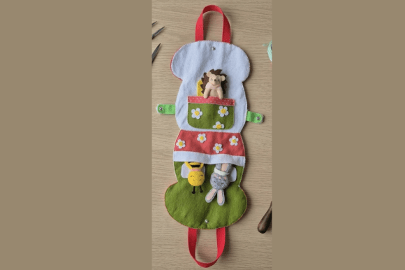 Hand sewn felt animals and mushroom bag